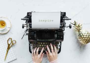 person using inspire typewriter