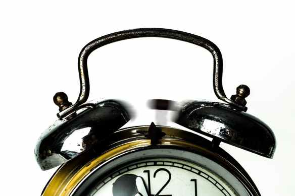 black ring bell alarm clock